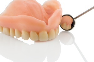 Dental Implants Or Dentures – Which Is Right For You?